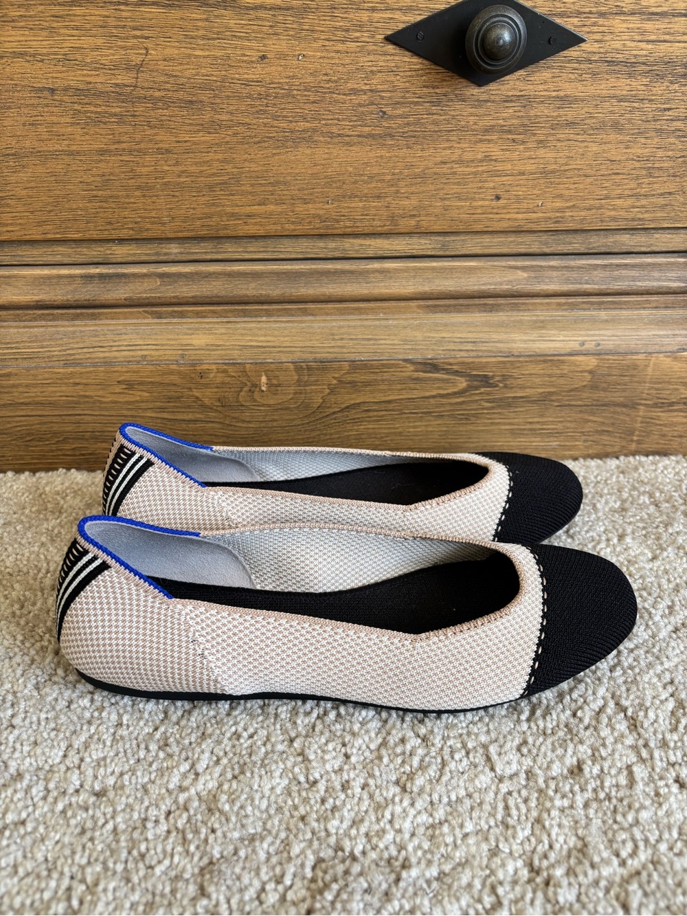 Like new 7.5 Rothy's The Square slip-on ballet flats
Beige cream and black